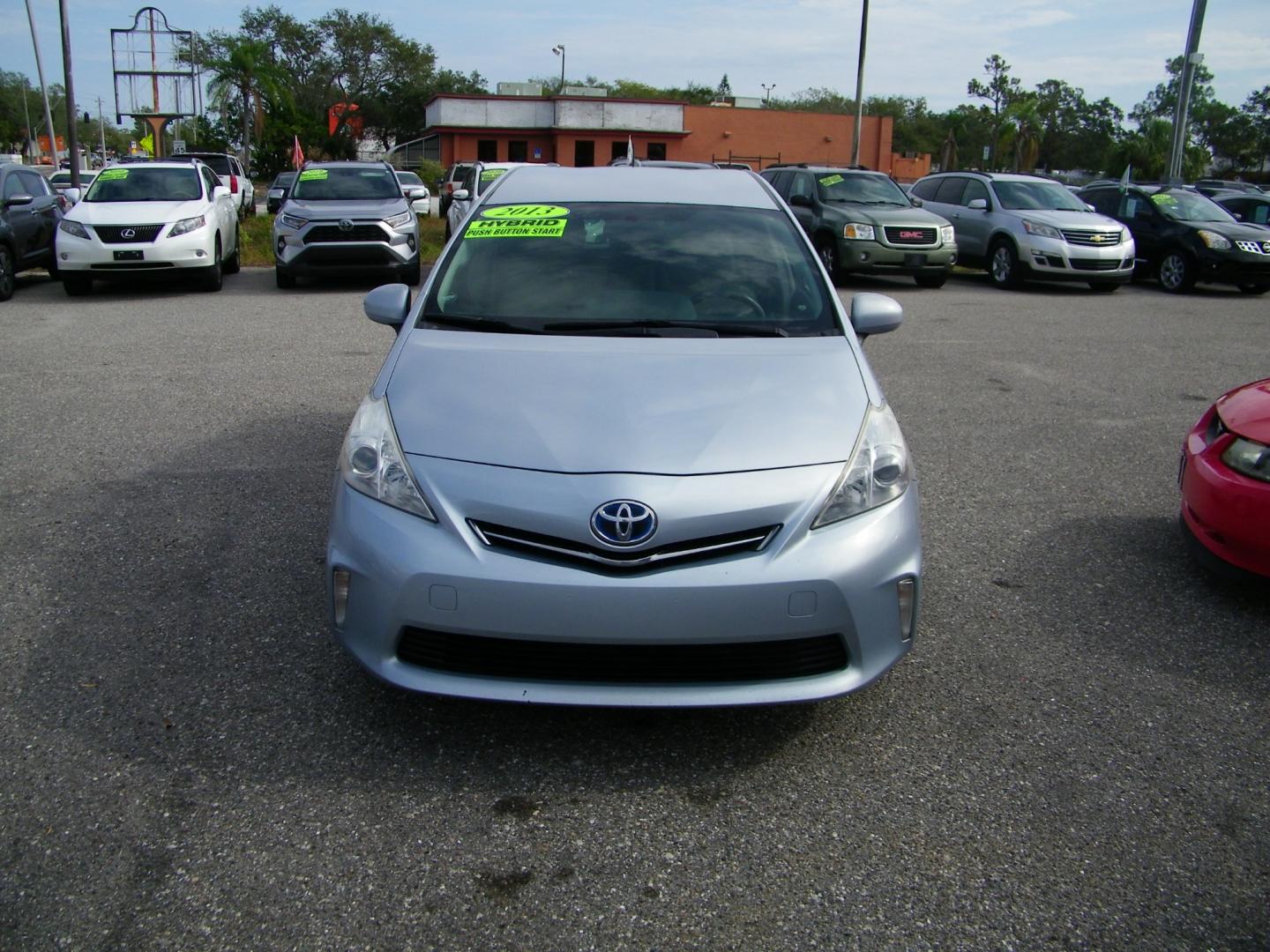 2013 Silver /Beige Toyota Prius V Three (JTDZN3EU5D3) with an 1.8L L4 DOHC 16V HYBRID engine, Continuously Variable Transmission transmission, located at 4000 Bee Ridge Road, Sarasota, FL, 34233, (941) 926-0300, 27.298664, -82.489151 - Photo#4